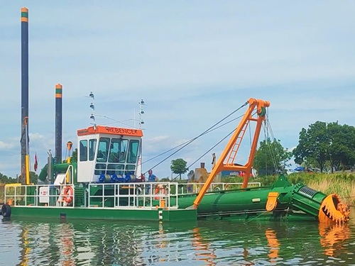 dredgers that remove mine tailings