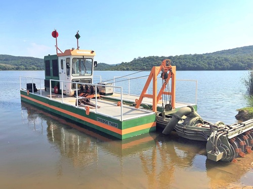 dredgers that deepen the lake bed to increase capacity of lakes