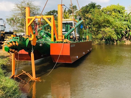 dredgers that dredge rivers to make them deeper and bigger
